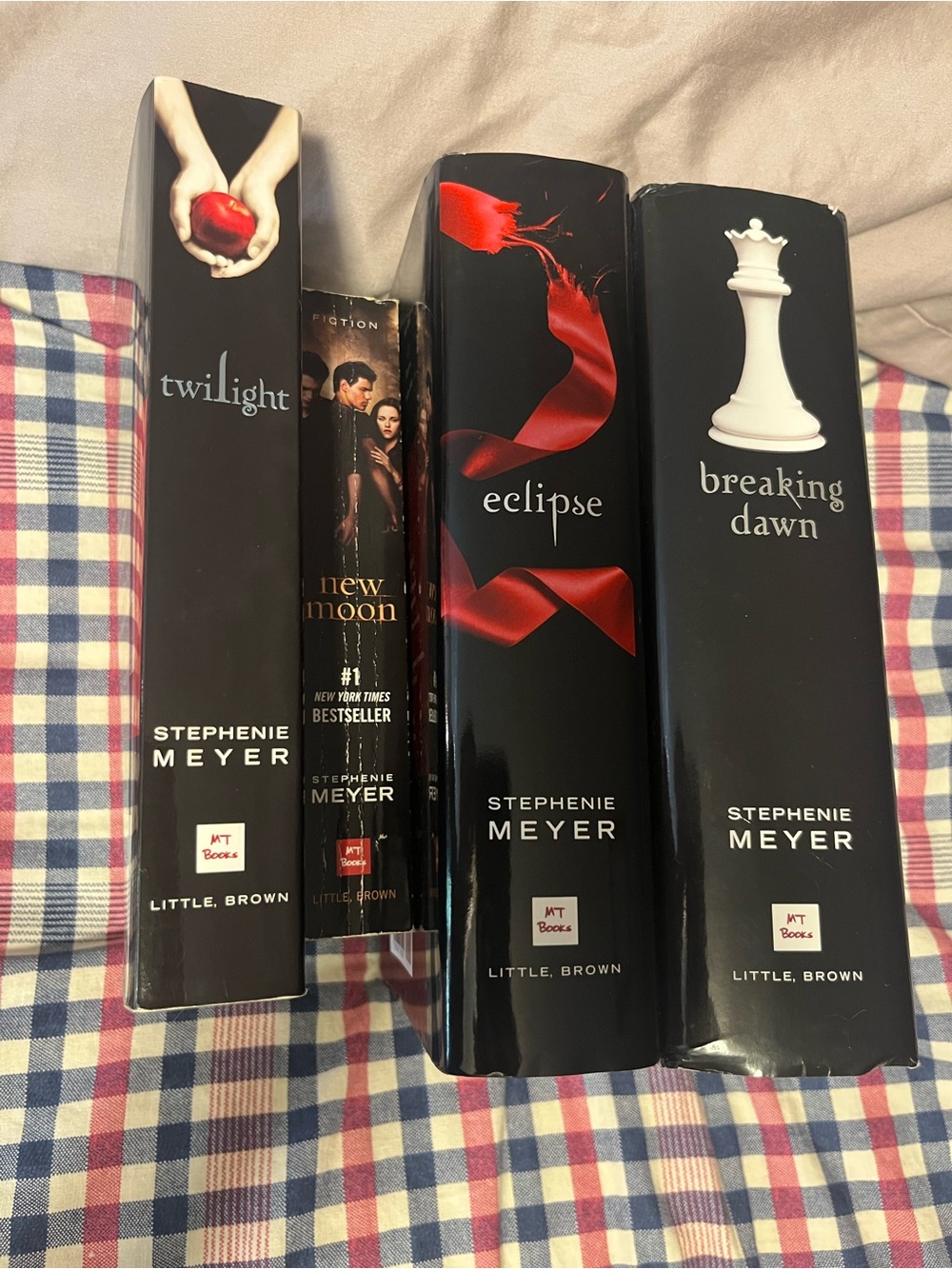 Stephenie Meyer Twilight series. All hardcover except New Moon